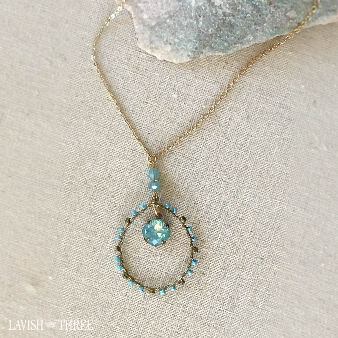 Delicate gold short necklace with large blue gemstone pendant, Lavish Three