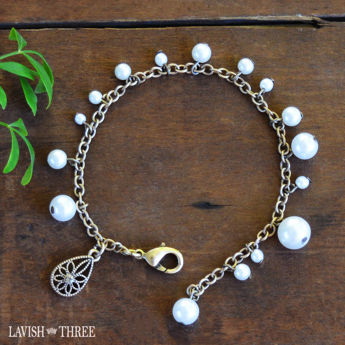 Brushed gold and pearl bracelet with flower charm one of a kind