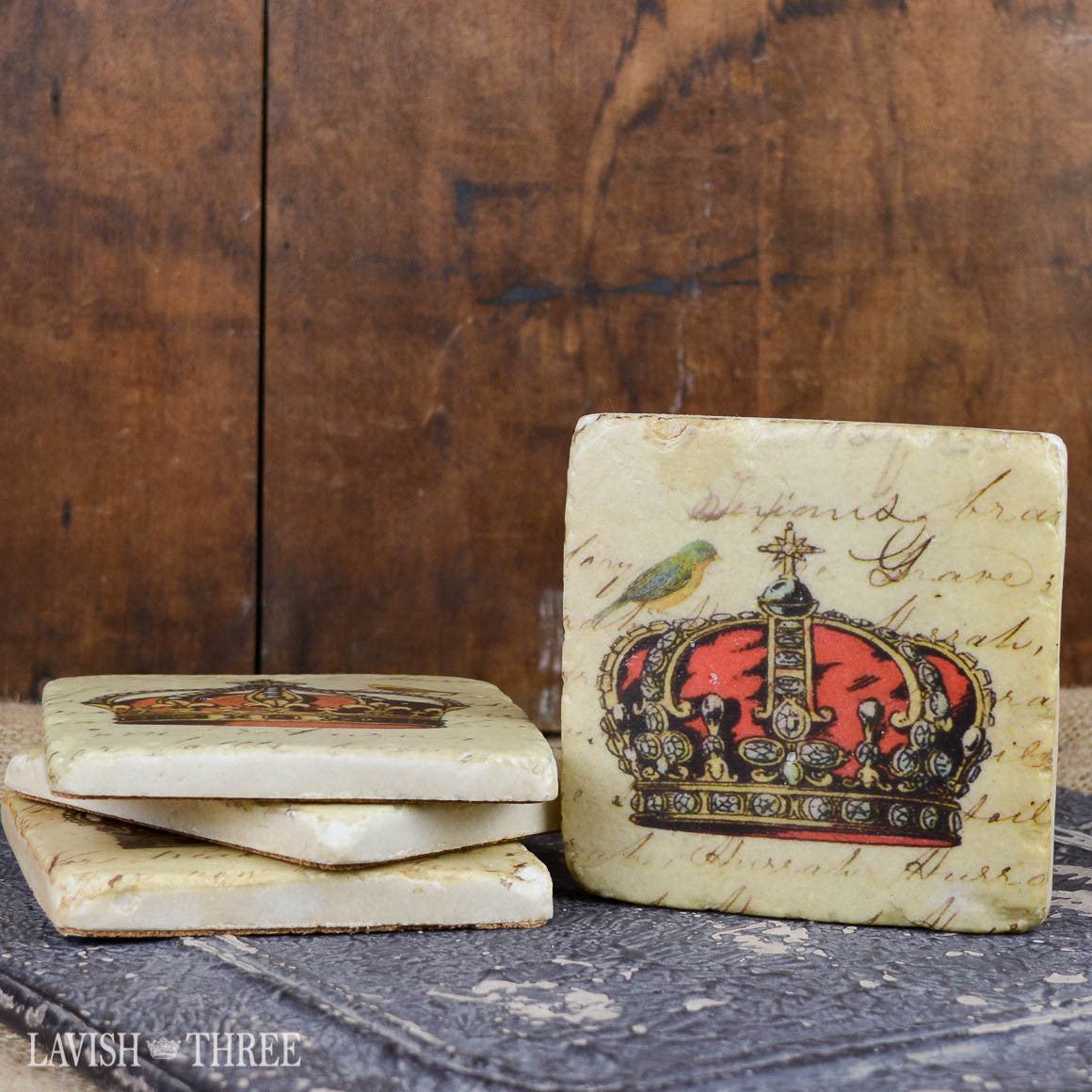 Coasters with crown design and bird