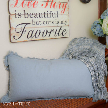Slate blue linen-like oblong pillow with fringe
