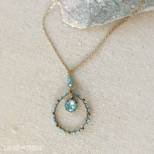 Delicate gold short necklace with large blue gemstone pendant, Lavish Three