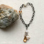 brushed silver bracelet with crystal bead and gem pendant, Lavish Three