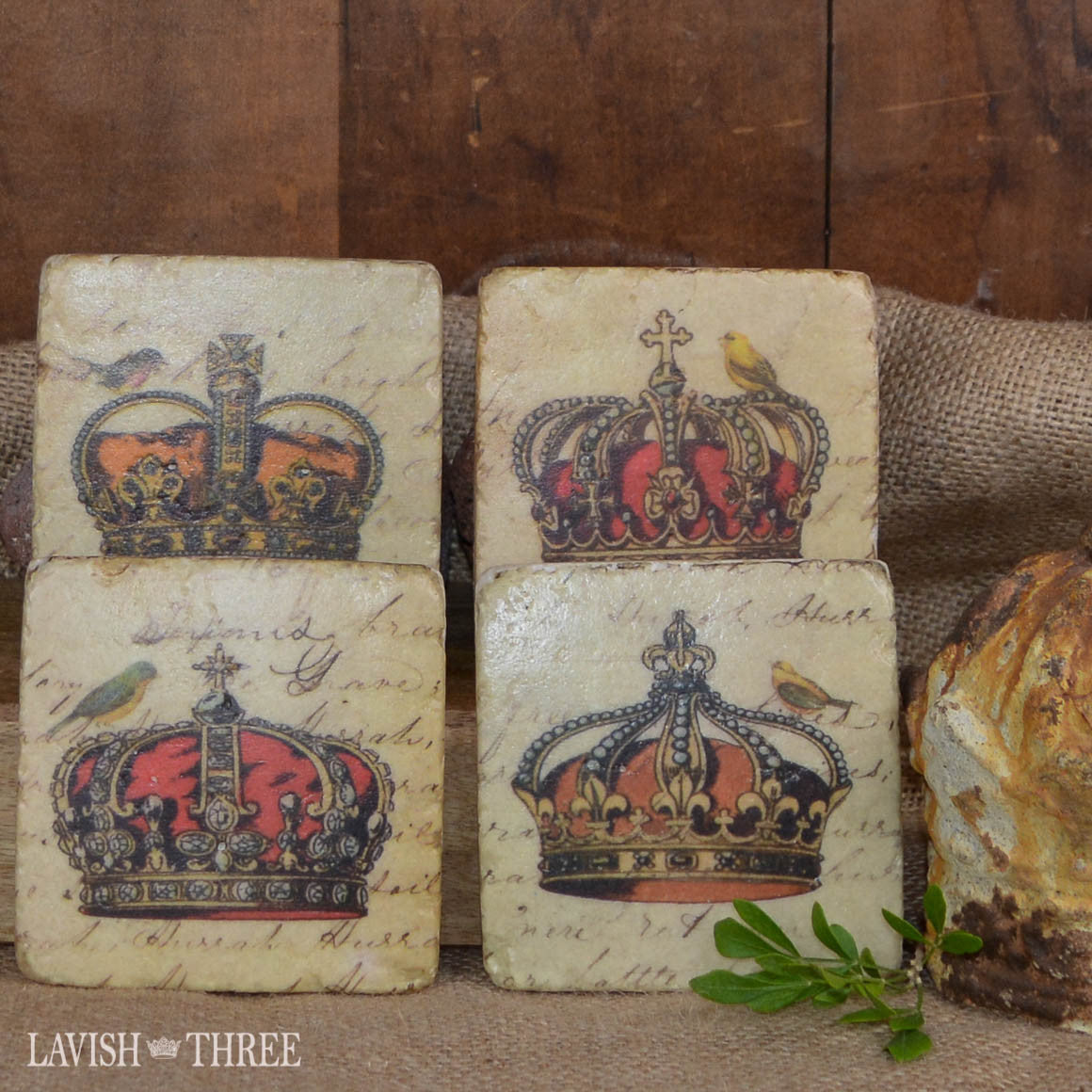 set of coasters with crown and birds 