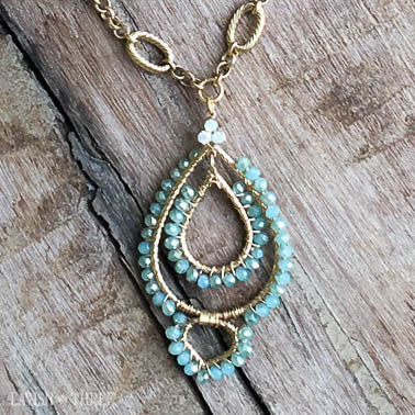 Statement with Style elegant gold chain, blue crystal pendant charm