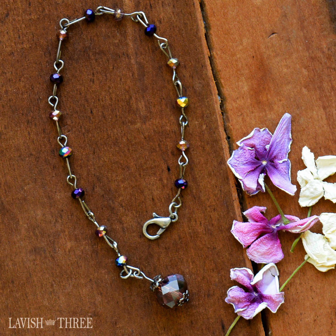 Silver and plum purple beaded bracelet