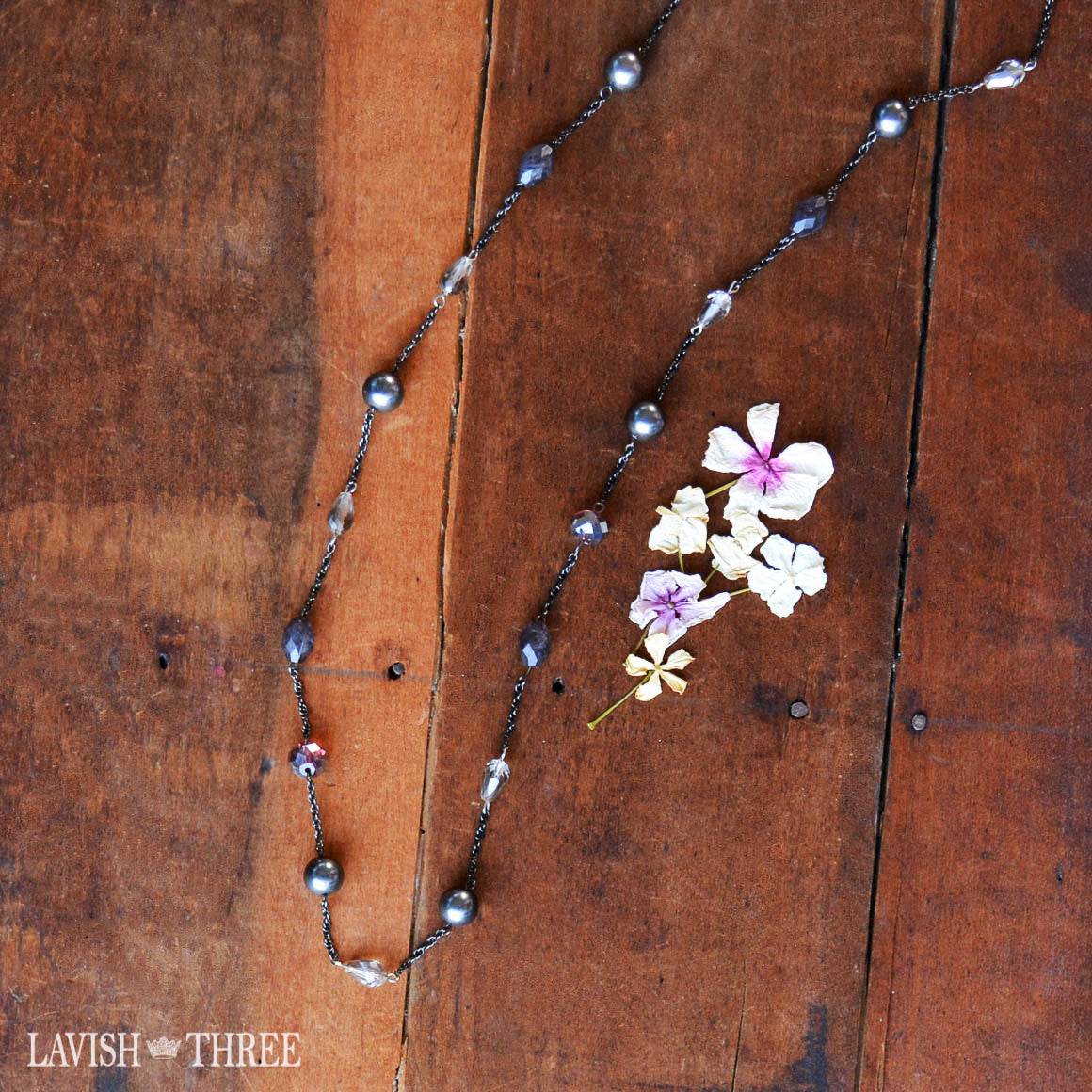 Gunmetal purple long strand necklace