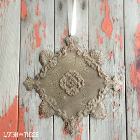 Rustic vintage shabby chic metal wall medallion with satin ribbon bronze