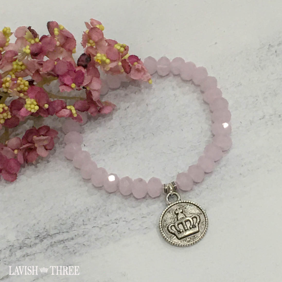 Pink bead bracelet with silver crown charm lavish three 3